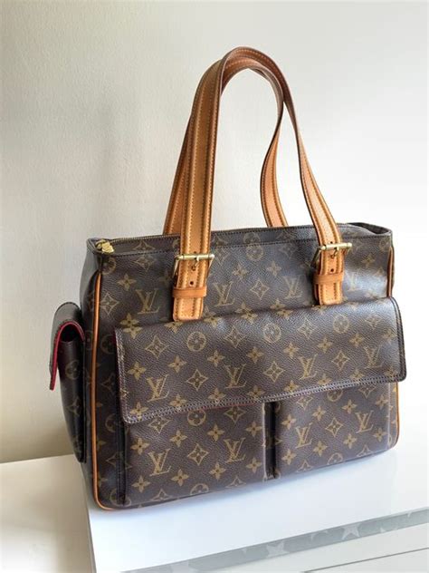 louis vuitton modelli vecchi con cerniere laterali|Louis Vuitton Borse vintage .